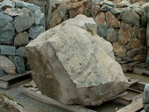 Photo of Buckscin Rhyolite Boulder. Use in landscaping. Natural stone sold by Rolleri Landscape Products.
