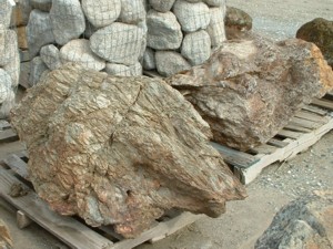 Photo of Saw Tooth Boulder. Use in landscaping. Natural stone sold by Rolleri Landscape Products.
