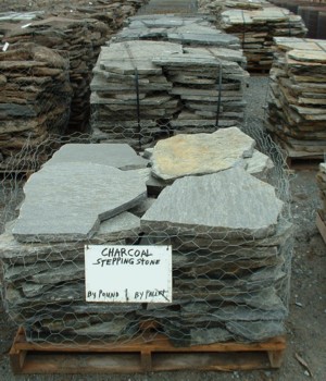 Photo of Charcoal Idho Quartize Stepping Stones flagstone. A natural stone product of Rolleri Landscape Products.