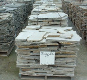 Photo of Silver Idho Quartize Patio flagstone. A natural stone product of Rolleri Landscape Products.