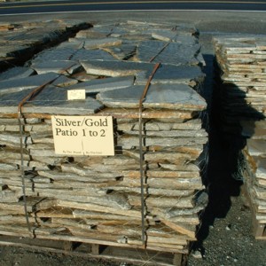 Photo of Silver/Gold Idho Quartzite Patio flagstone. A natural stone product of Rolleri Landscape Products.