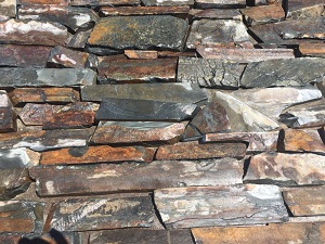 Photo of IRONSIDE Veneer. Sawed Natural Stone Veneer sold by Rolleri Landscape Products.