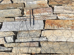 Photo of Moon Light Ledge Veneer. Sawed Natural Stone Veneer sold by Rolleri Landscape Products.