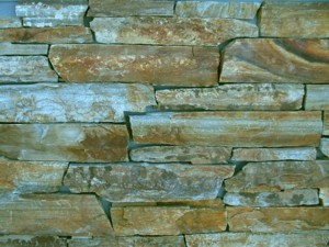 Photo of Old West Ledge Veneer. Sawed Natural Stone Veneer sold by Rolleri Landscape Products.