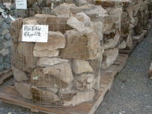 Photo of Buckskin Rhyolite Wall Rock. For Dry-stack, Masonry, or Landscaping wall stone. Natural stone sold by Rolleri Landscape Products.