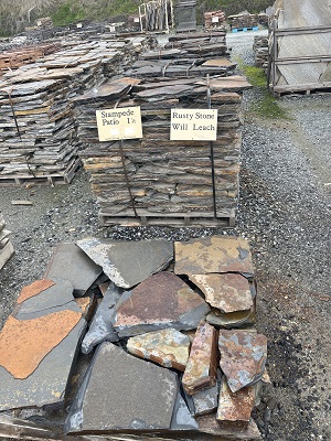 Photo of Stampede 1 1/2 in. Patio random shaped flagestone pavers. Natural stone sold by Rolleri Landscape Products.